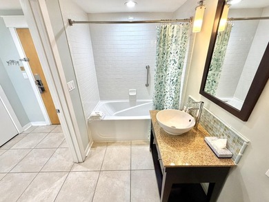 Beautifully perched on the seventh floor, this light and airy - photo 17