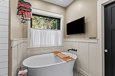 Set on 1.24 private waterfront acres, this exceptional - photo 17