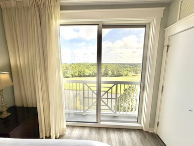 Beautifully perched on the seventh floor, this light and airy - photo 18