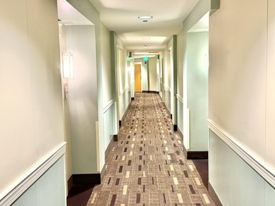 Beautifully perched on the seventh floor, this light and airy - photo 20
