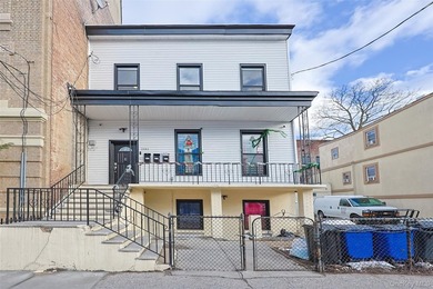 Fully Renovated Three-Family Homes - Strong Investment - photo 1