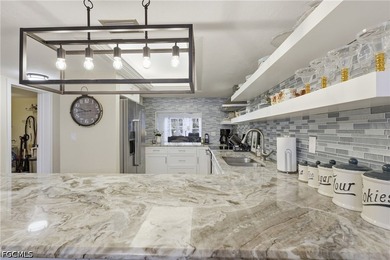 This impeccably updated 1,314-square-foot condo offers a rare - photo 4