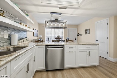This impeccably updated 1,314-square-foot condo offers a rare - photo 5