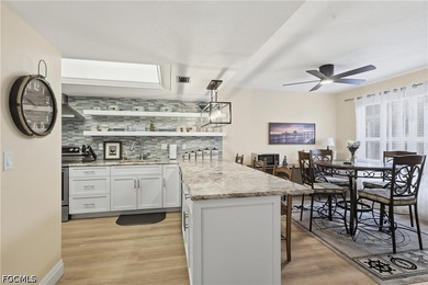 This impeccably updated 1,314-square-foot condo offers a rare - photo 8