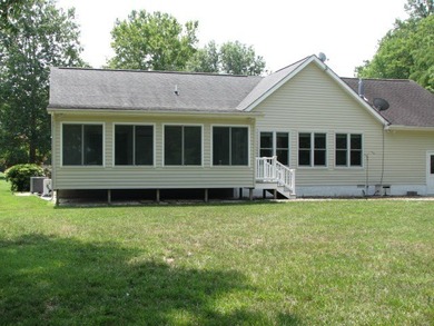 This beautiful one-owner, three-bedroom home sits just off the - photo 3