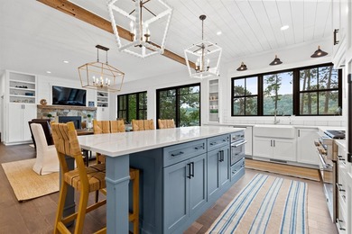 Set on nearly an acre with 201 feet of pristine Lake - photo 16