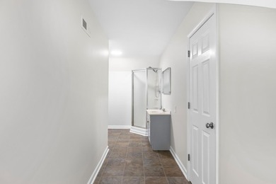 TOTALLY RENOVATED, ALL NEW KITCHEN, FRESH PAINT, NEW FLOORING - photo 18