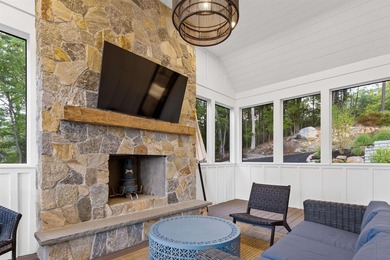 Set on nearly an acre with 201 feet of pristine Lake - photo 20