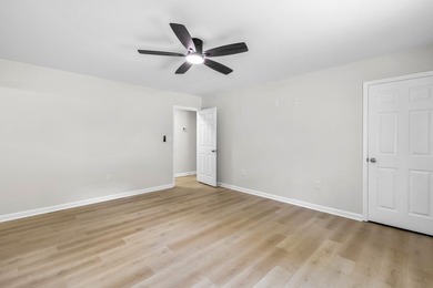 TOTALLY RENOVATED, ALL NEW KITCHEN, FRESH PAINT, NEW FLOORING - photo 24