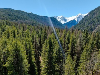 Nestled in the heart of Montana's unspoiled wilderness, this - photo 30
