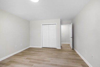 TOTALLY RENOVATED, ALL NEW KITCHEN, FRESH PAINT, NEW FLOORING - photo 31