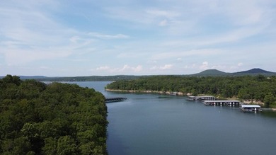 Welcome to The Cove, a brand new gated lakefront community on - photo 2