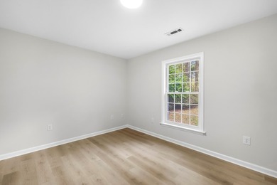 TOTALLY RENOVATED, ALL NEW KITCHEN, FRESH PAINT, NEW FLOORING - photo 32