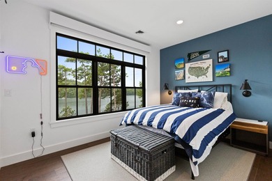 Set on nearly an acre with 201 feet of pristine Lake - photo 45