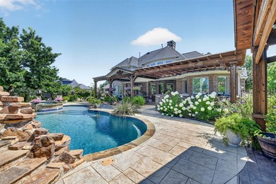 Timeless elegance awaits on an expansive 1.13-acre lot in the - photo 3