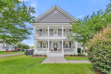 Nestled on a desirable corner lot, this beautiful two-story home - photo 1