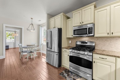 Nestled on a desirable corner lot, this beautiful two-story home - photo 6