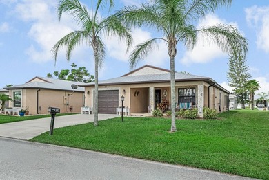 Charming home in Spanish Lakes One, a desirable 55+ community in - photo 2