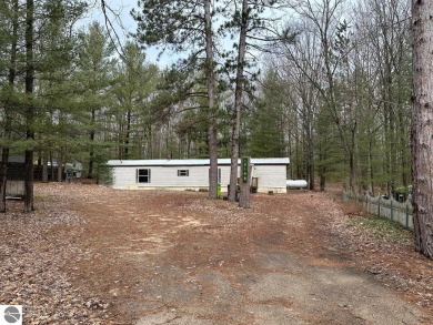 Cedar Hedge Lake Home For Sale in Interlochen Michigan