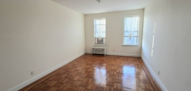 Ideally located just off Northern Blvd, this bright and - photo 3