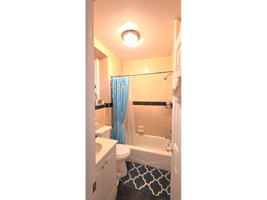 Ideally located just off Northern Blvd, this bright and - photo 8