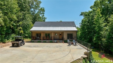 Lake Home For Sale in Carlton, Georgia