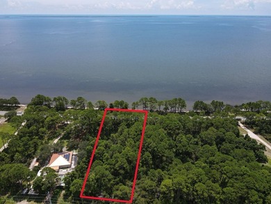 1.29 acres of wooded property with 102 feet of bay frontage for - photo 3