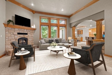 Well-maintained no-step home on a wooded cul-de-sac lot with