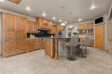 Well-maintained no-step home on a wooded cul-de-sac lot with