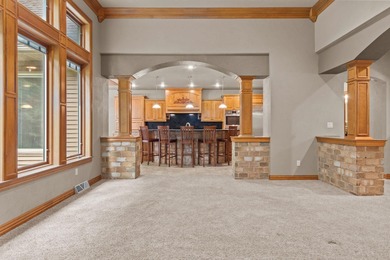 Well-maintained no-step home on a wooded cul-de-sac lot with