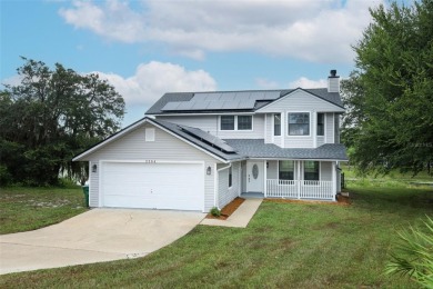 Lake Home For Sale in Deltona, Florida