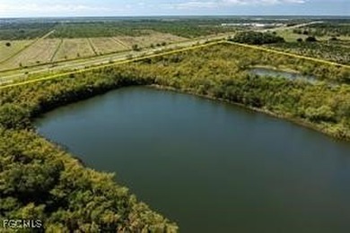 163+ acres located in Hendry County on SR 80 W. Directly across - photo 12
