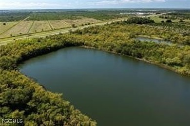 163+ acres located in Hendry County on SR 80 W. Directly across - photo 13