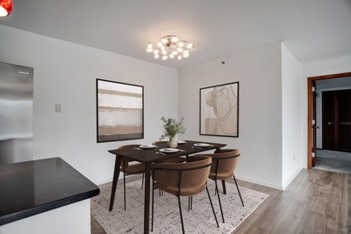 Experience the best of urban living in this sun-filled two