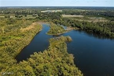 163+ acres located in Hendry County on SR 80 W. Directly across - photo 15
