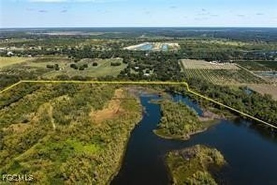 163+ acres located in Hendry County on SR 80 W. Directly across - photo 17