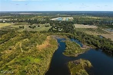 163+ acres located in Hendry County on SR 80 W. Directly across - photo 18