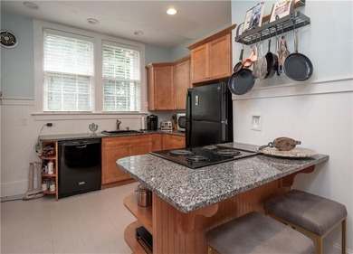 Tucked off Kay St, this side by side two family home is a - photo 26