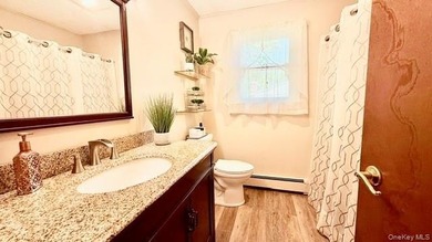Lovely And Well-Maintained Raised Ranch Set on 67 x 161 Property - photo 9