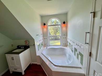 Own a beautiful LAKE House on 4.25 Acres with a gentle slope to - photo 31