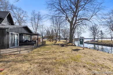 Tucked along 64 feet of private channel frontage with direct - photo 5