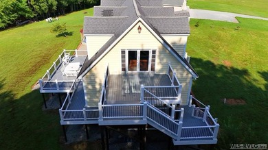 Own a beautiful LAKE House on 4.25 Acres with a gentle slope to - photo 43