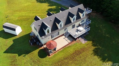 Own a beautiful LAKE House on 4.25 Acres with a gentle slope to - photo 49