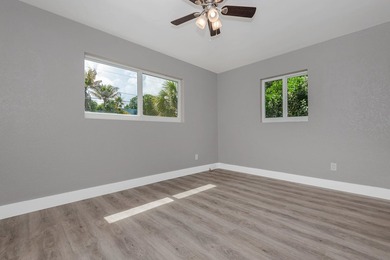 Discover this charming 3-bedroom, 2-bathroom single-family - photo 13