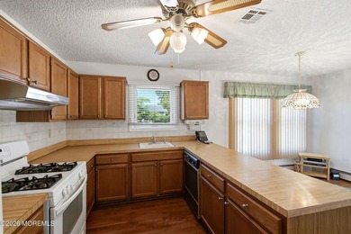 Welcome to this well-maintained 2-BR 2-BA home located in the - photo 9