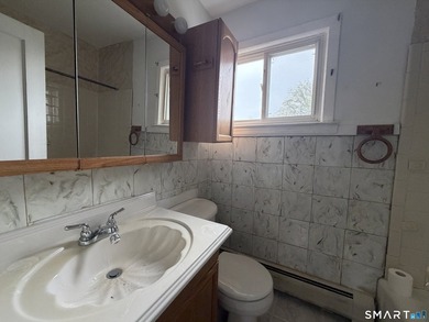 2 BR, 1 BA townhouse-style unit with great potential! Features - photo 11