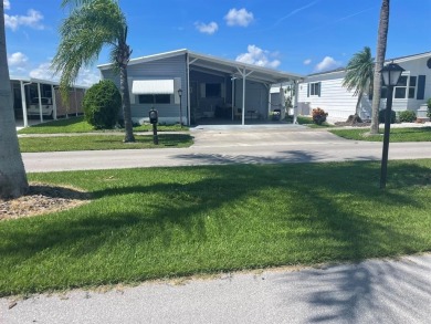 Lake Home For Sale in Coconut Creek, Florida