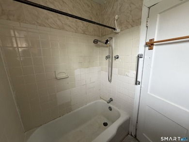 2 BR, 1 BA townhouse-style unit with great potential! Features - photo 12