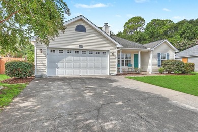Nestled on a prime corner lot with serene pond views, this - photo 3