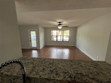 ALL AGES GATED COMMUNITY FIRST FLOOR UNIT TOTALLY REMODELED WITH - photo 24